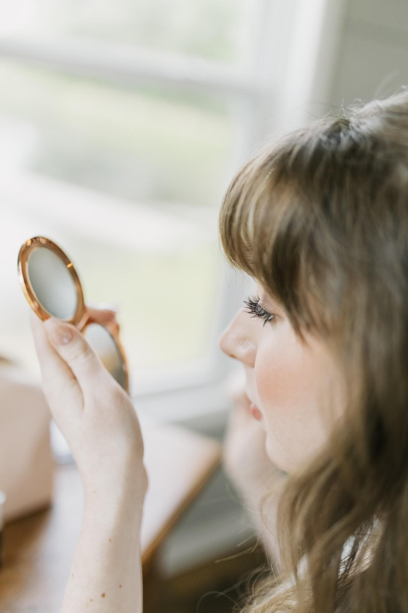 Jessica getting ready on her wedding day
