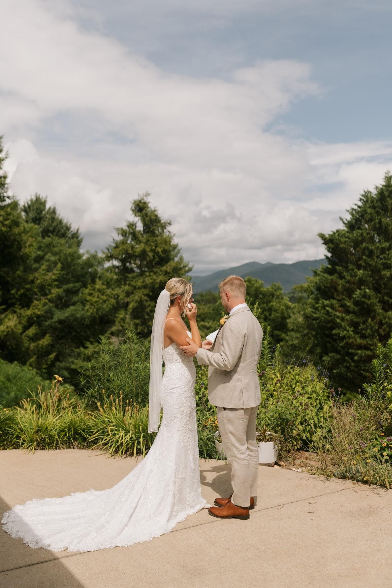 Carly and Drew sharing private vows during their first look at Emerald Ridge in Weaverville, NC